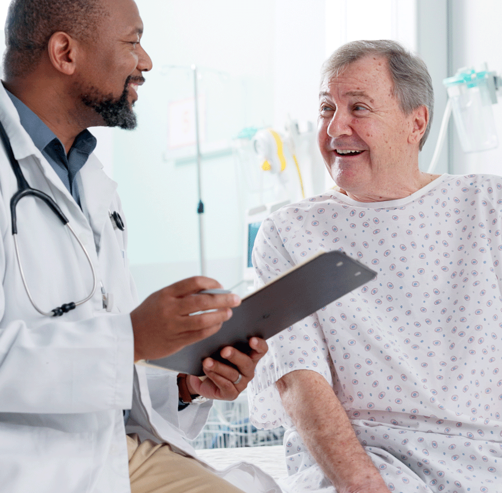 Doctor and patient smiling during consultation